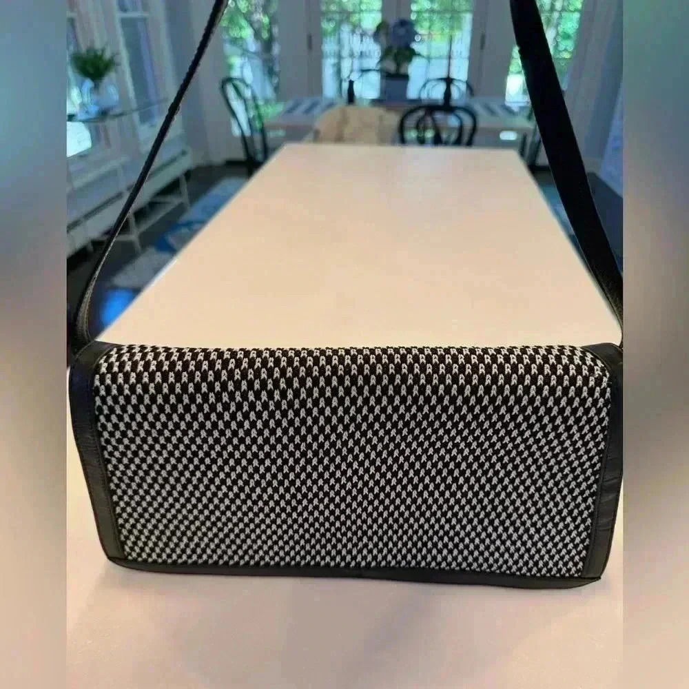 The Sak black shoulder back with woven black and white front. NEW
